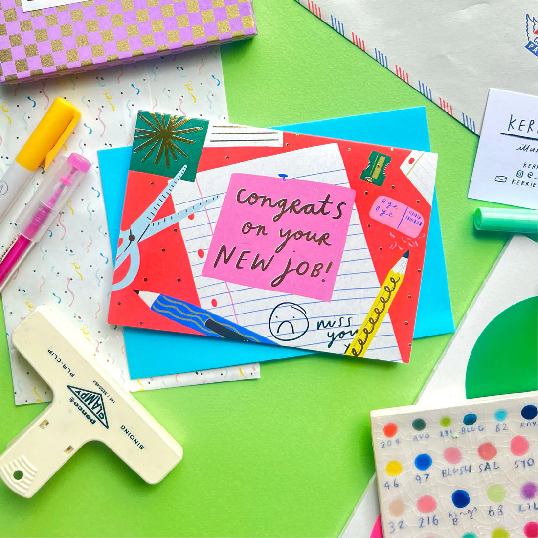 A6 Card with hand-written "Congrats on your new job!" text, stationary illustrations and a blue envelope
