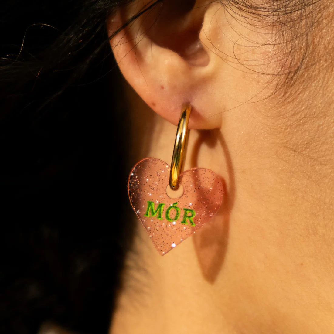 'Grá Mór' heart hoop earrings modelled