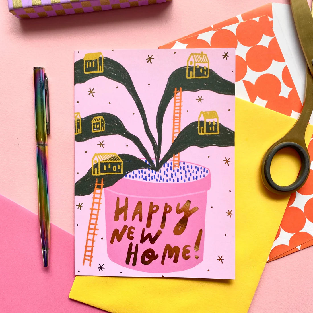 A6 Card with hand-written "Happy new home" text, plant, house and ladder illustrations and a yellow envelope