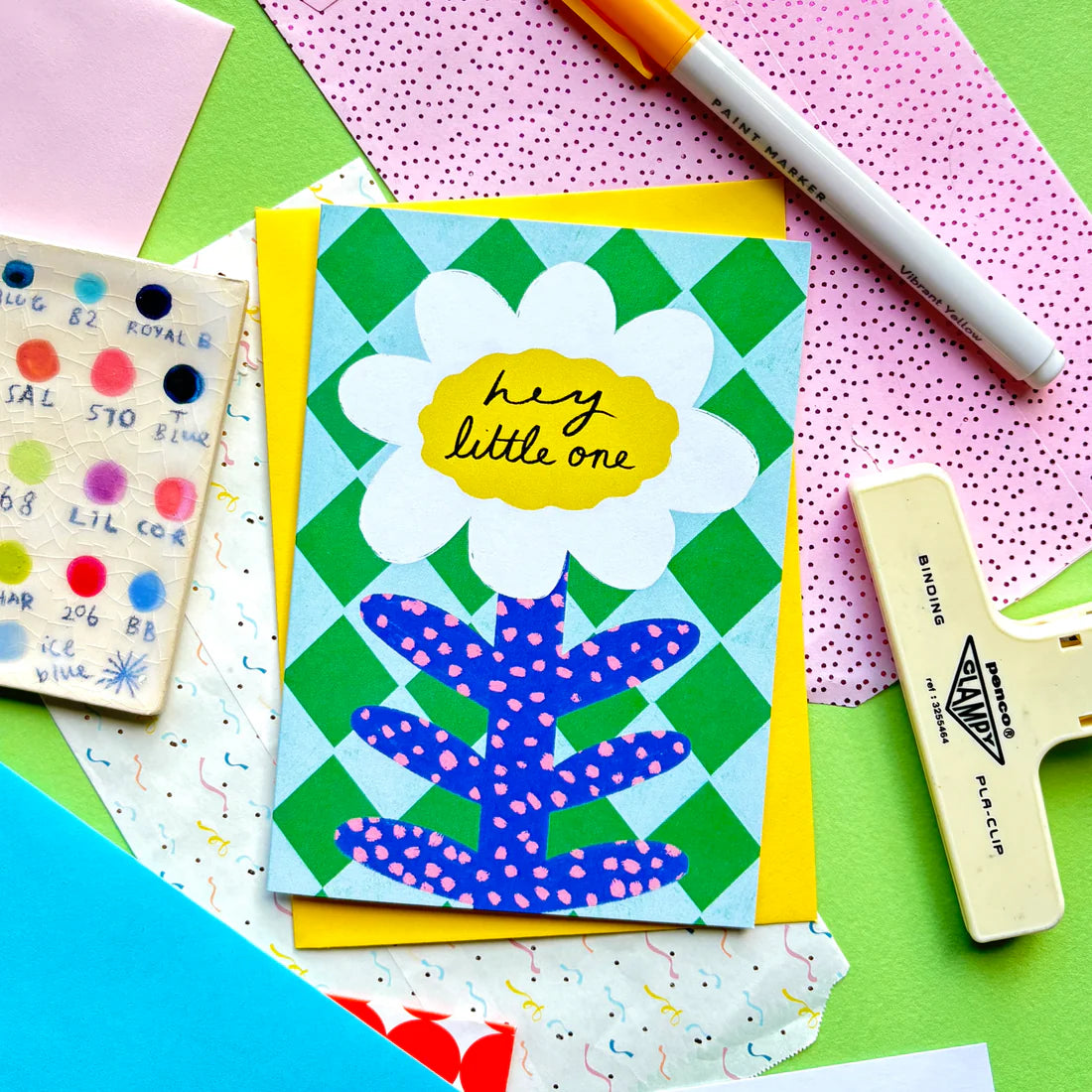 A6 Card with hand-written "Hey little one" text, daisy illustration and a yellow envelope