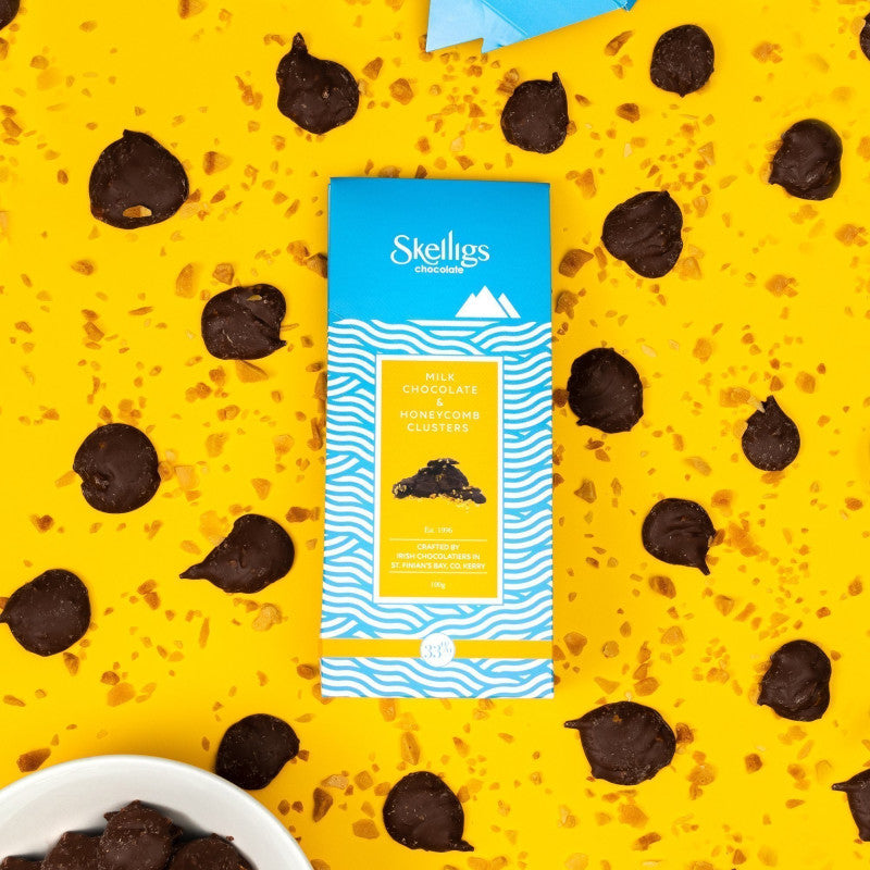Skelligs milk chocolate and honeycomb clusters on a yellow background