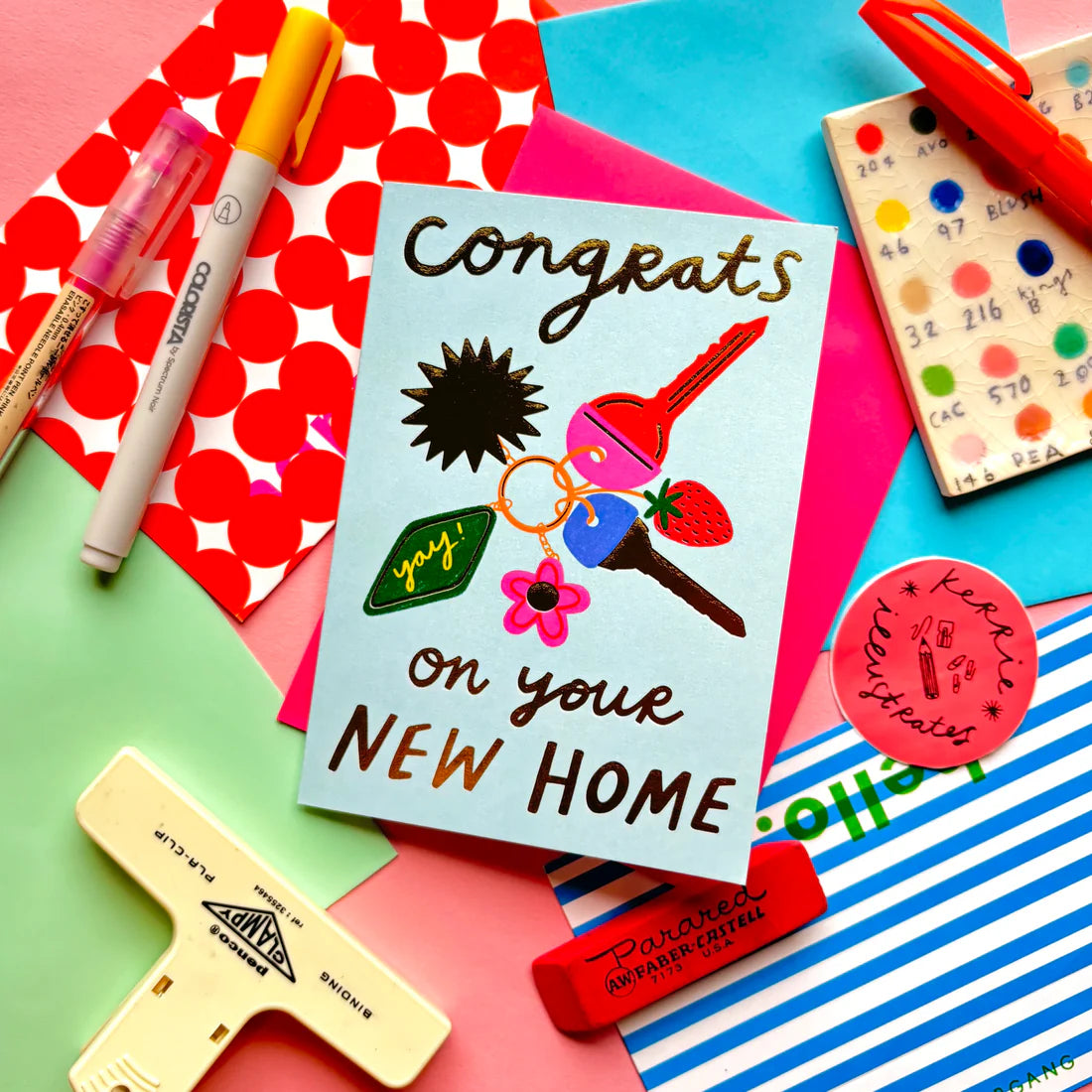 A6 Card with hand-written "Congrats on your new home" text, keys illustration and a pink envelope